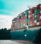a large cargo ship loaded with lots of containers