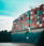 a large cargo ship loaded with lots of containers